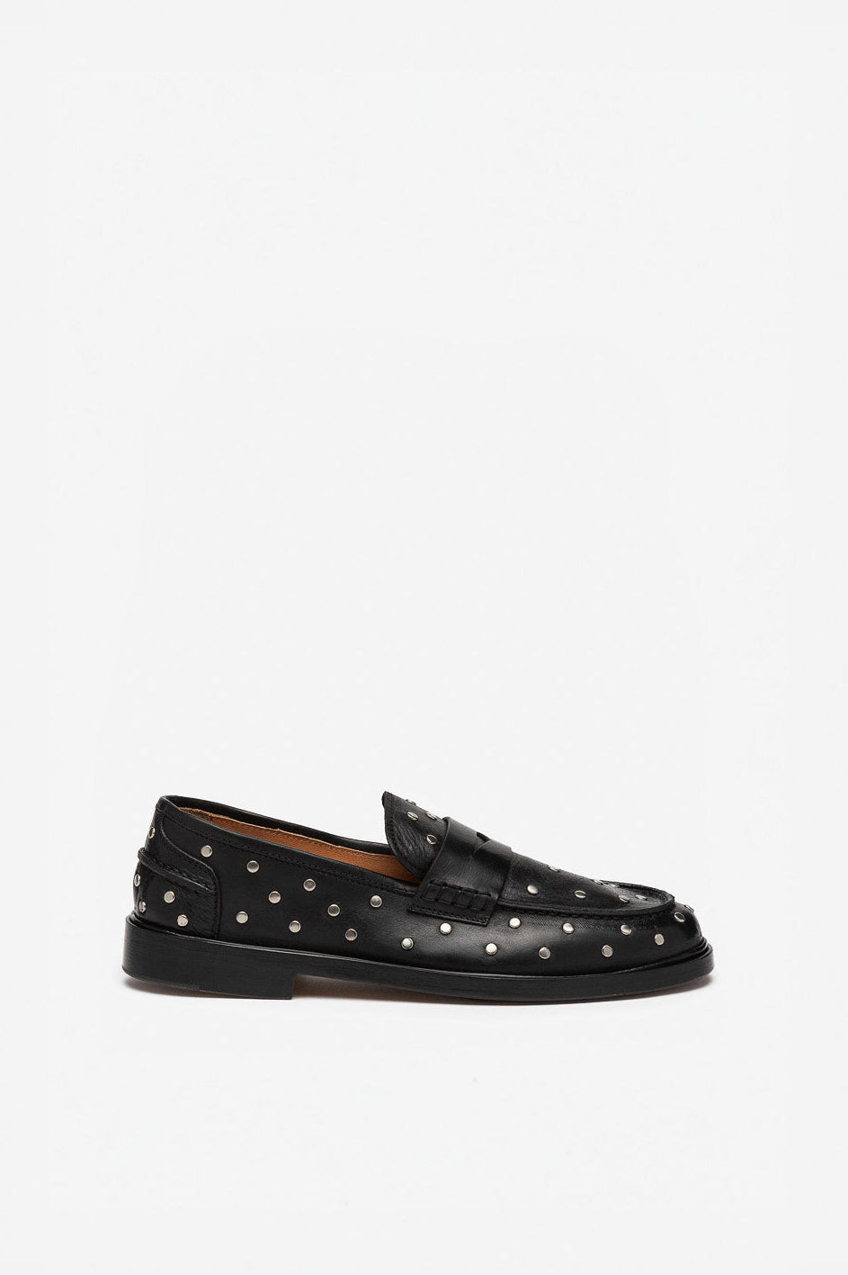 Black loafer with studded details on a white background